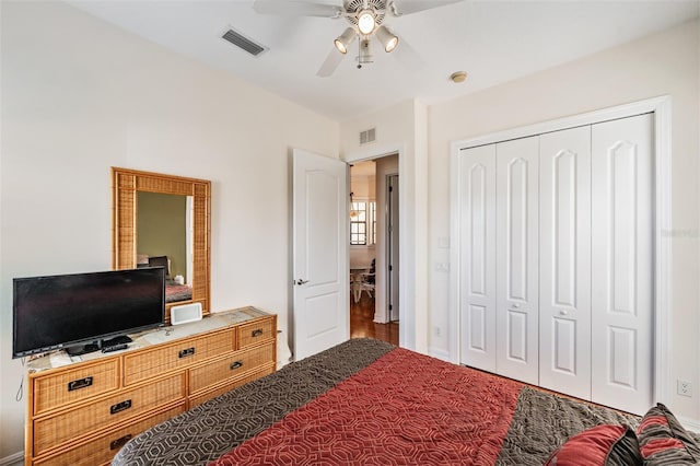 bedroom featuring a closet, ceiling fan, and baseboards