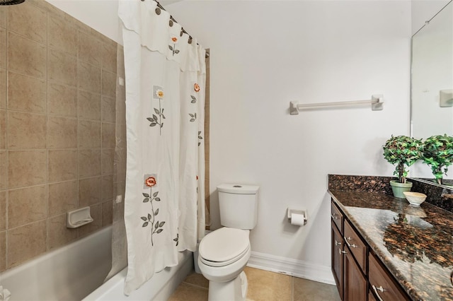 full bath with tile patterned flooring, vanity, toilet, shower / bath combo with shower curtain, and baseboards