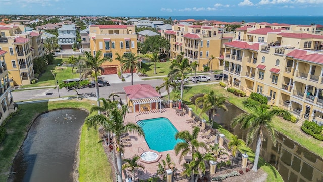 aerial view of a large body of water and a pool area