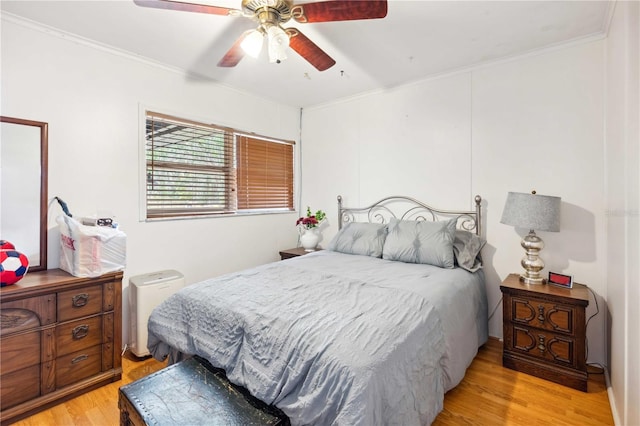 36601 Roberts Rd, Dade City, FL 33525 - bedroom with a ceiling fan, ornamental molding, and light wood finished floors