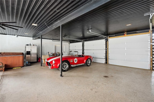 36601 Roberts Rd, Dade City, FL 33525 - garage with stainless steel fridge with ice dispenser