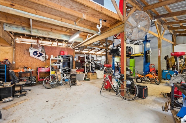 36601 Roberts Rd, Dade City, FL 33525 - garage featuring a workshop area