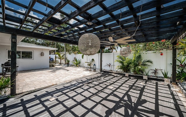 view of patio featuring a pergola and a fenced backyard