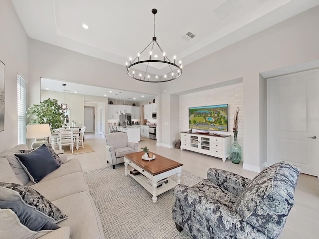 4300 Barletta Ct, Wesley Chapel, FL 33543 - living area with a chandelier, recessed lighting, and a towering ceiling