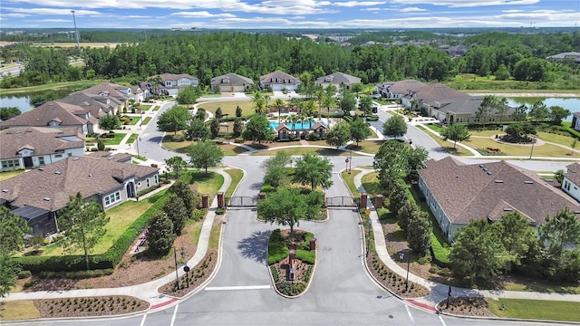4300 Barletta Ct, Wesley Chapel, FL 33543 - aerial perspective of suburban area with a nearby body of water and a pool area