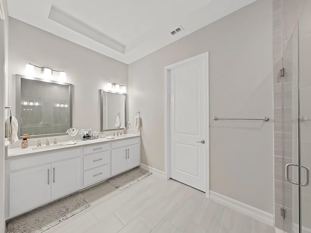 4300 Barletta Ct, Wesley Chapel, FL 33543 - full bathroom with a shower stall, double vanity, and baseboards