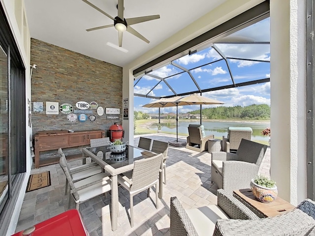 4300 Barletta Ct, Wesley Chapel, FL 33543 - view of patio / terrace with a water view, ceiling fan, outdoor dining area, glass enclosure, and an outdoor hangout area