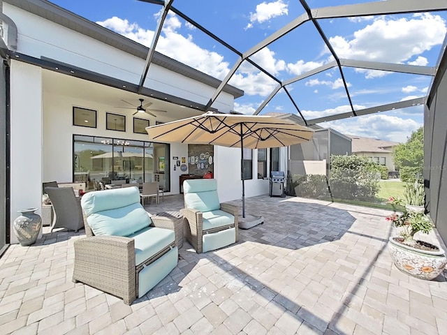 4300 Barletta Ct, Wesley Chapel, FL 33543 - view of patio with a ceiling fan, a grill, glass enclosure, and an outdoor hangout area