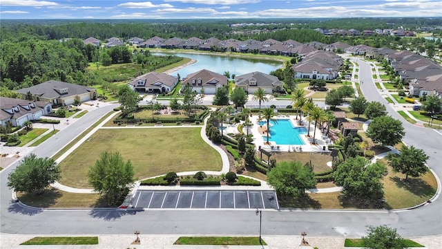 4300 Barletta Ct, Wesley Chapel, FL 33543 - aerial perspective of suburban area featuring a pool and a nearby body of water