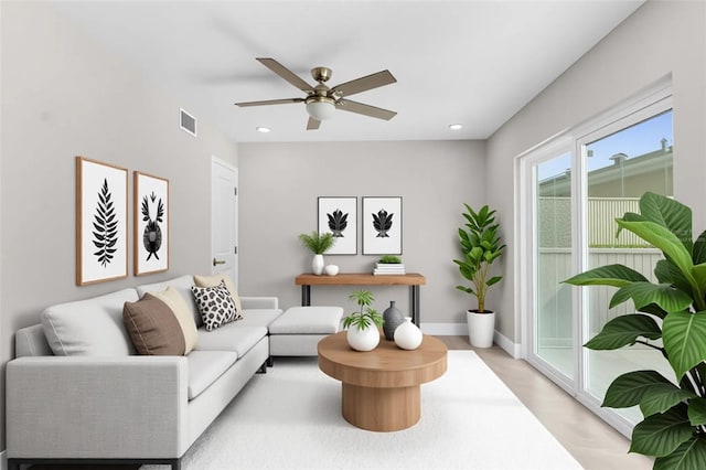 105 E Davis Blvd Unit A, Tampa, FL 33606 - living room with a ceiling fan, baseboards, visible vents, and recessed lighting