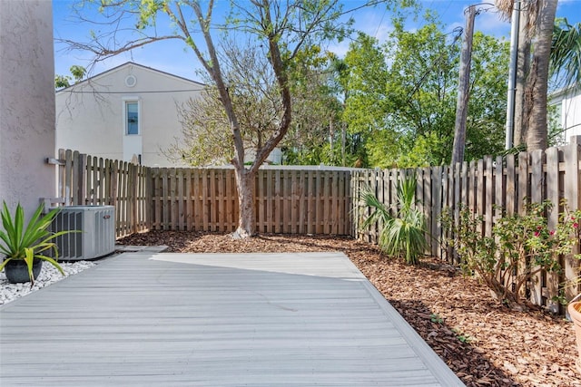 105 E Davis Blvd Unit A, Tampa, FL 33606 - wooden deck featuring a fenced backyard and central AC