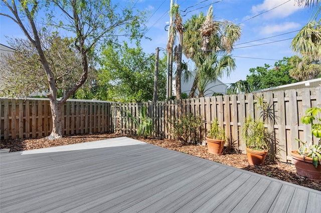 105 E Davis Blvd Unit A, Tampa, FL 33606 - wooden terrace with a fenced backyard