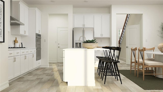 11554 71st Ave E, Palmetto, FL 34221 - kitchen with light wood-style floors, white cabinets, a kitchen island with sink, and white refrigerator with ice dispenser