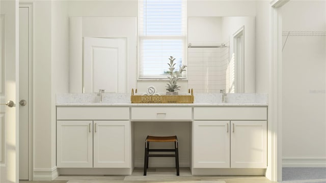 11554 71st Ave E, Palmetto, FL 34221 - full bathroom with double vanity and a sink