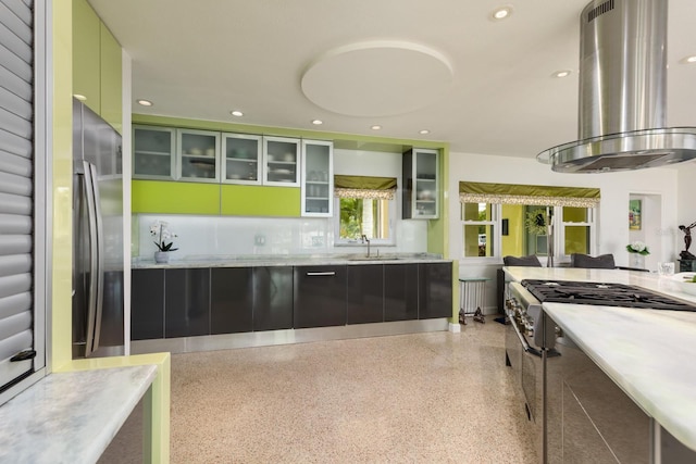 2487 W Bay Isle Dr SE, Saint Petersburg, FL 33705 - kitchen with light speckled floor, recessed lighting, island exhaust hood, a sink, and stainless steel appliances