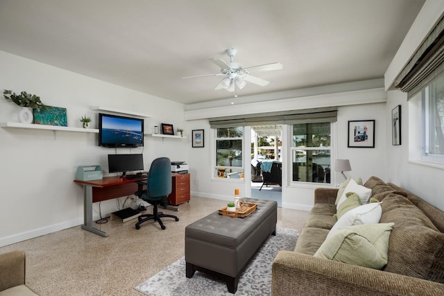 2487 W Bay Isle Dr SE, Saint Petersburg, FL 33705 - office space with baseboards, a ceiling fan, and speckled floor