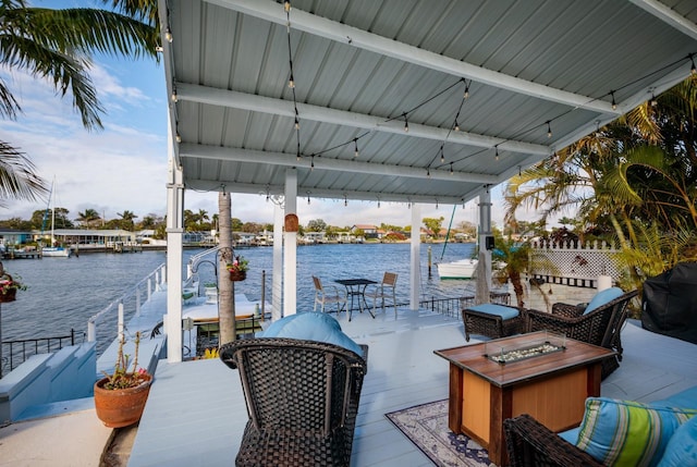 2487 W Bay Isle Dr SE, Saint Petersburg, FL 33705 - view of dock with boat lift and a water view