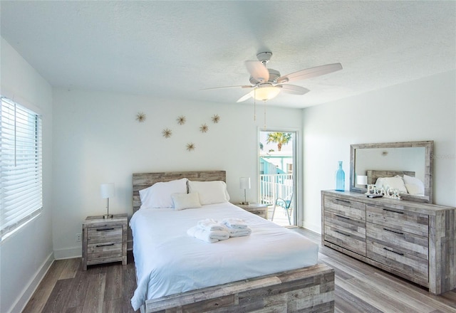 bedroom with wood finished floors, access to exterior, baseboards, ceiling fan, and a textured ceiling