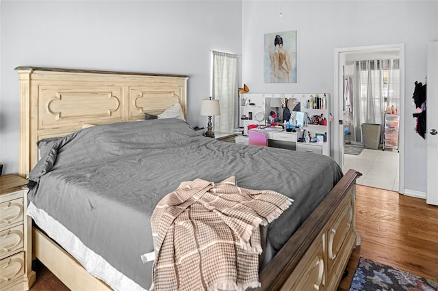 8712 Ashbury Dr, Hudson, FL 34667 - bedroom with wood finished floors