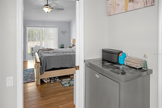 8712 Ashbury Dr, Hudson, FL 34667 - bedroom featuring ceiling fan and wood finished floors