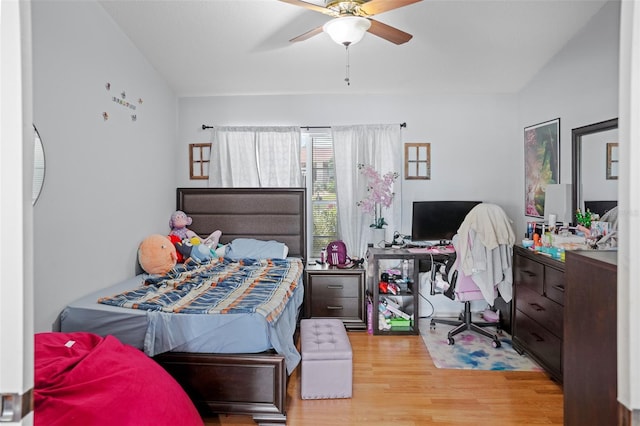 8712 Ashbury Dr, Hudson, FL 34667 - bedroom with a ceiling fan and wood finished floors