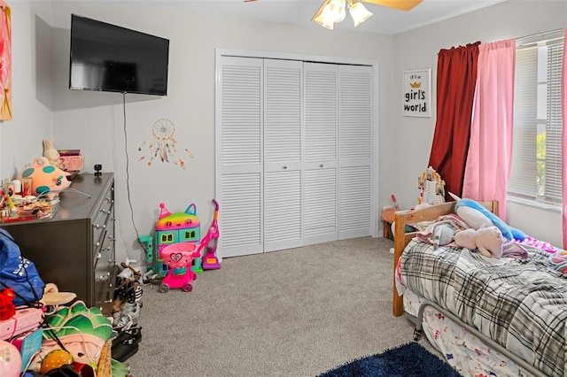 8712 Ashbury Dr, Hudson, FL 34667 - bedroom with a closet, a ceiling fan, and carpet