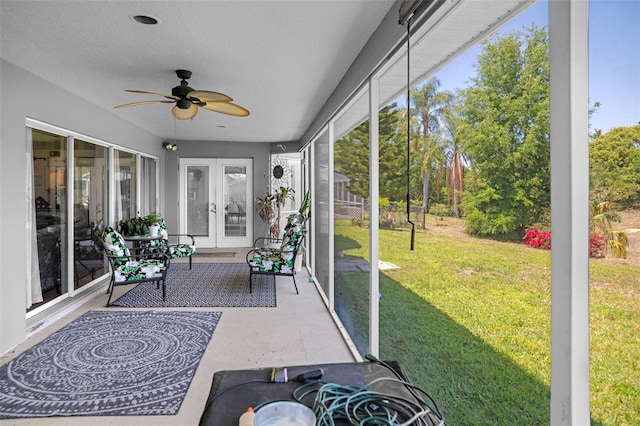 8712 Ashbury Dr, Hudson, FL 34667 - sunroom / solarium with french doors and ceiling fan