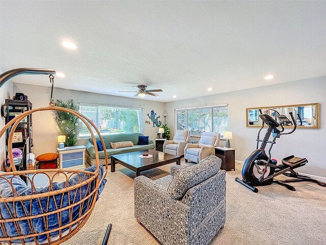 149 Sky Loch Dr E, Dunedin, FL 34698 - carpeted living area with recessed lighting, ceiling fan, and a wealth of natural light