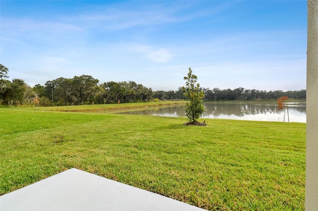 view of yard with a water view