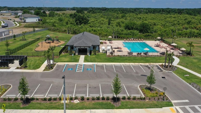 drone / aerial view with a view of trees