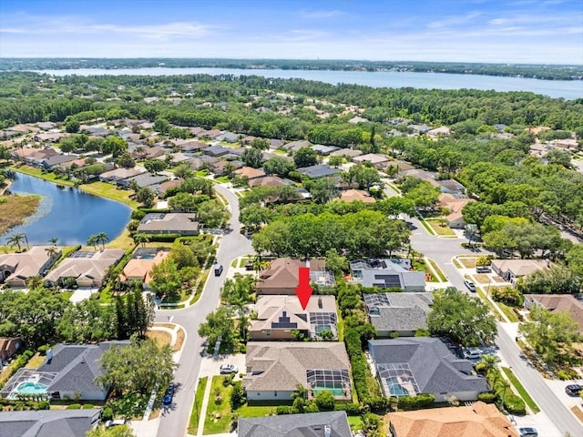 5216 Kernwood Ct, Palm Harbor, FL 34685 - aerial view of residential area featuring a nearby body of water