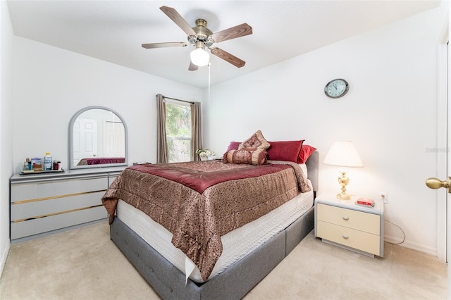 29542 Forest Glen Dr, Wesley Chapel, FL 33543 - bedroom with light colored carpet, a ceiling fan, and baseboards