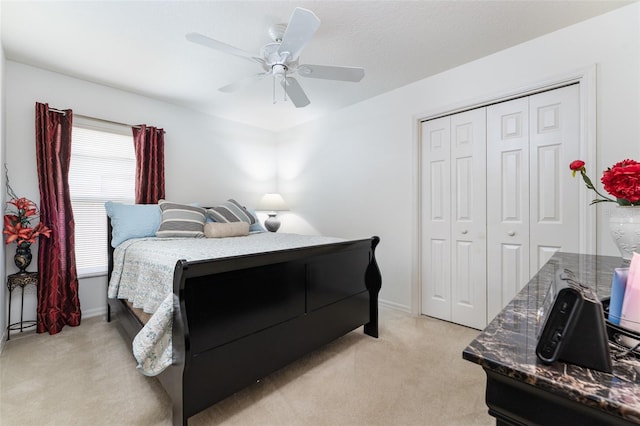 29542 Forest Glen Dr, Wesley Chapel, FL 33543 - bedroom with ceiling fan, light colored carpet, baseboards, and a closet