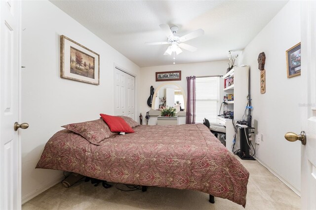 29542 Forest Glen Dr, Wesley Chapel, FL 33543 - bedroom featuring carpet floors, baseboards, a ceiling fan, and a closet