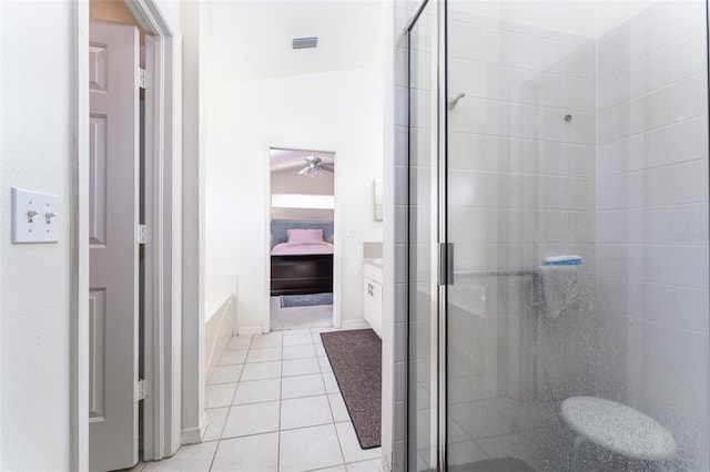 29542 Forest Glen Dr, Wesley Chapel, FL 33543 - full bathroom with tile patterned flooring, a ceiling fan, ensuite bathroom, visible vents, and a stall shower