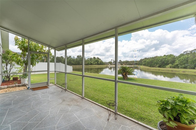 29542 Forest Glen Dr, Wesley Chapel, FL 33543 - unfurnished sunroom featuring a water view
