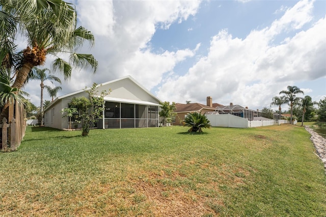 29542 Forest Glen Dr, Wesley Chapel, FL 33543 - view of yard with fence and a sunroom