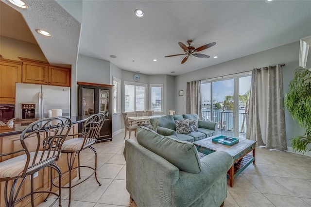 620 Bayway Blvd Unit 1, Clearwater, FL 33767 - living room with light tile patterned floors, ceiling fan, and recessed lighting
