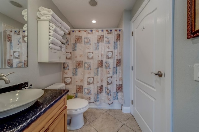 620 Bayway Blvd Unit 1, Clearwater, FL 33767 - full bath with tile patterned flooring, recessed lighting, toilet, and vanity