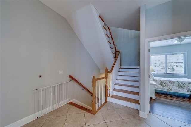 620 Bayway Blvd Unit 1, Clearwater, FL 33767 - staircase with baseboards and tile patterned floors