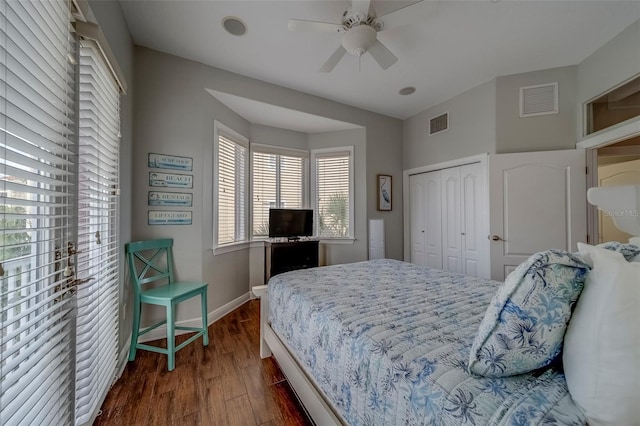620 Bayway Blvd Unit 1, Clearwater, FL 33767 - bedroom with baseboards, a closet, dark wood-style flooring, and visible vents