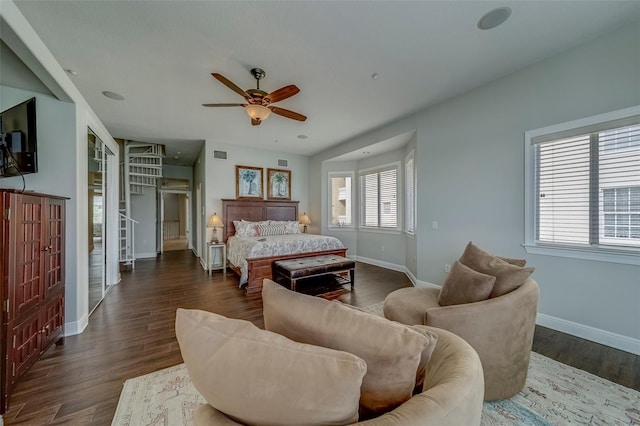 620 Bayway Blvd Unit 1, Clearwater, FL 33767 - bedroom with baseboards, ceiling fan, dark wood-type flooring, and visible vents