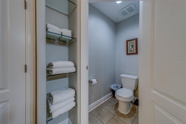 620 Bayway Blvd Unit 1, Clearwater, FL 33767 - bathroom with visible vents, baseboards, tile patterned flooring, and toilet