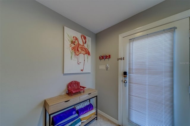 620 Bayway Blvd Unit 1, Clearwater, FL 33767 - doorway to outside with baseboards
