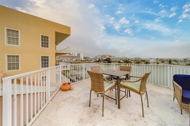 620 Bayway Blvd Unit 1, Clearwater, FL 33767 - exterior space featuring outdoor dining area and a water view