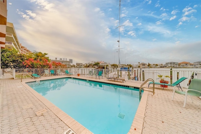 620 Bayway Blvd Unit 1, Clearwater, FL 33767 - pool featuring a patio area and fence