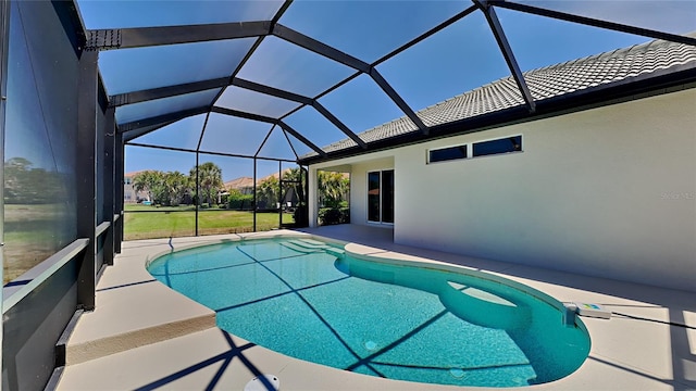 outdoor pool featuring a lanai and a patio