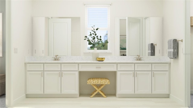 12054 Violet Jasper Dr, Parrish, FL 34219 - full bath featuring baseboards, double vanity, and a sink