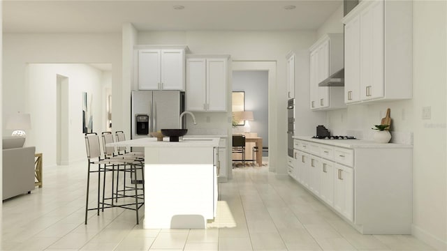 12062 Violet Jasper Dr, Parrish, FL 34219 - kitchen featuring white cabinets, a sink, an island with sink, fridge with ice dispenser, and cooktop