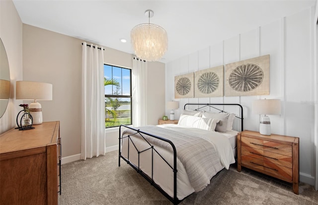 bedroom featuring baseboards, recessed lighting, a notable chandelier, and light carpet